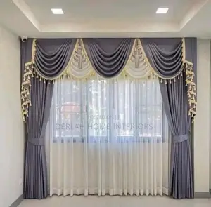 Complete Set of Sitting Room Curtains With a Design