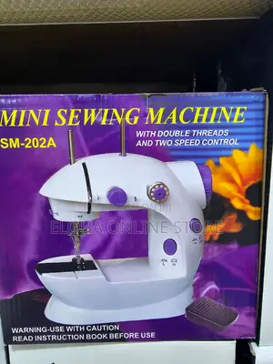 Photo - Mini Sewing Machine
