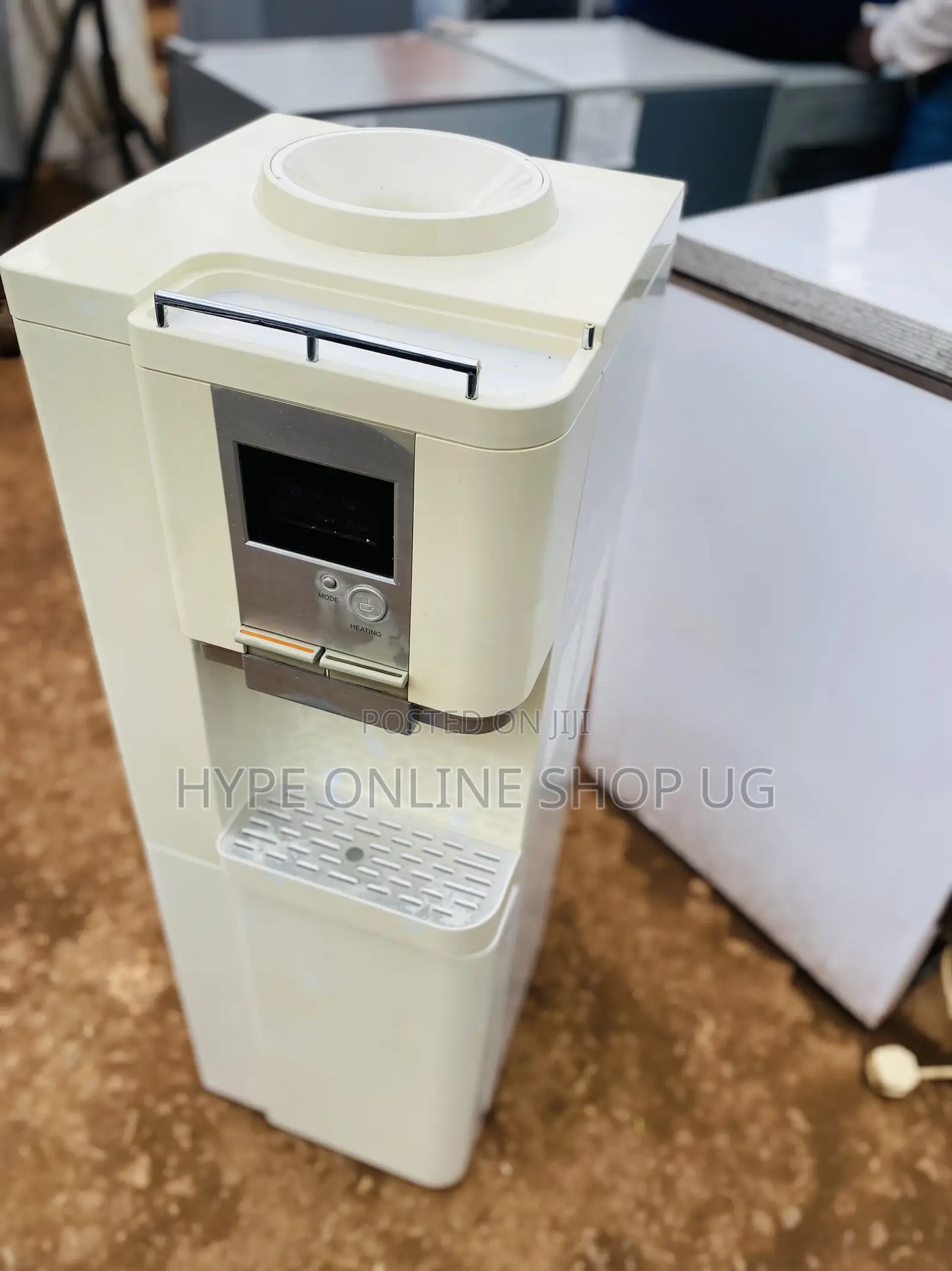 Water Dispenser With a Fridge