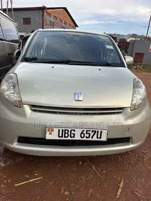 Photo - Toyota Passo 1.0 AWD 2008 Beige