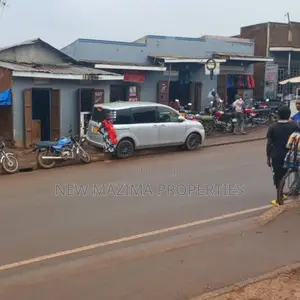 Very Busy Commercial Plot on Quicksale in Heart of Nsambya