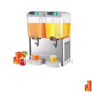 Photo - Double Electric Juice Dispenser.