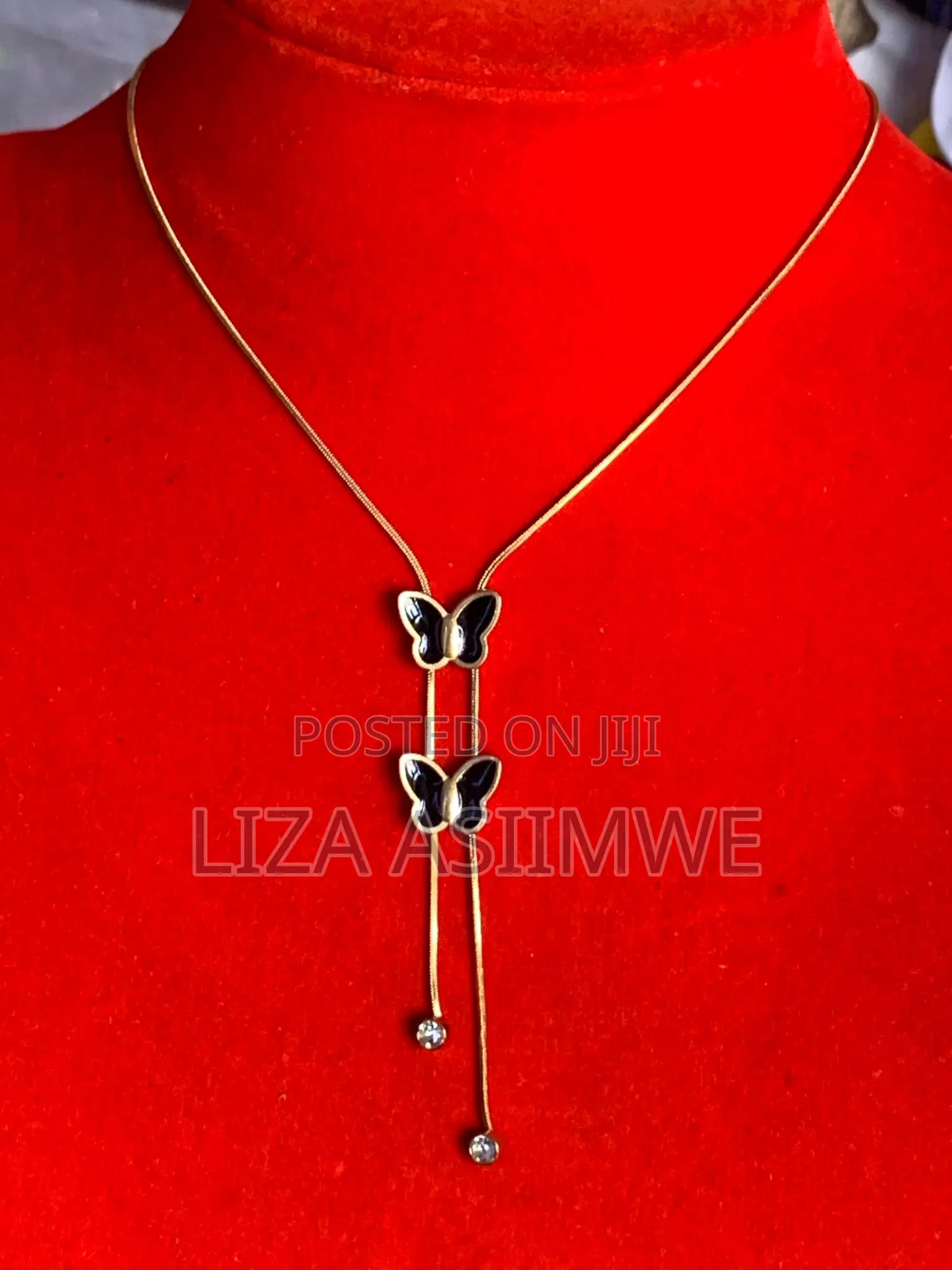 Lady’S Gold Butterfly Necklace Mixed With Black