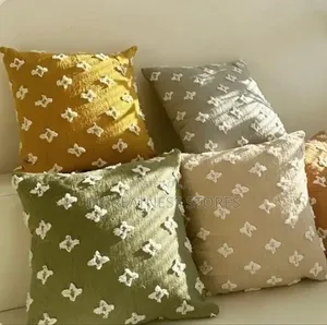 A Pair of Filled Fibre Cushions