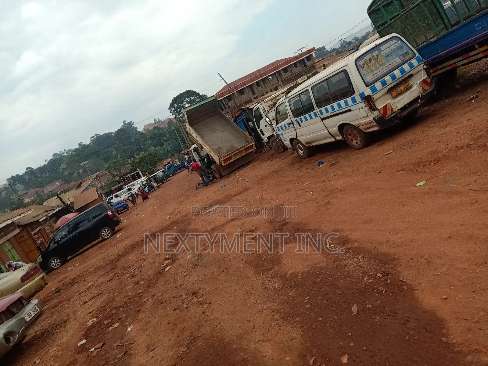 Acre of Land on Main Road in Kyengera Town.
