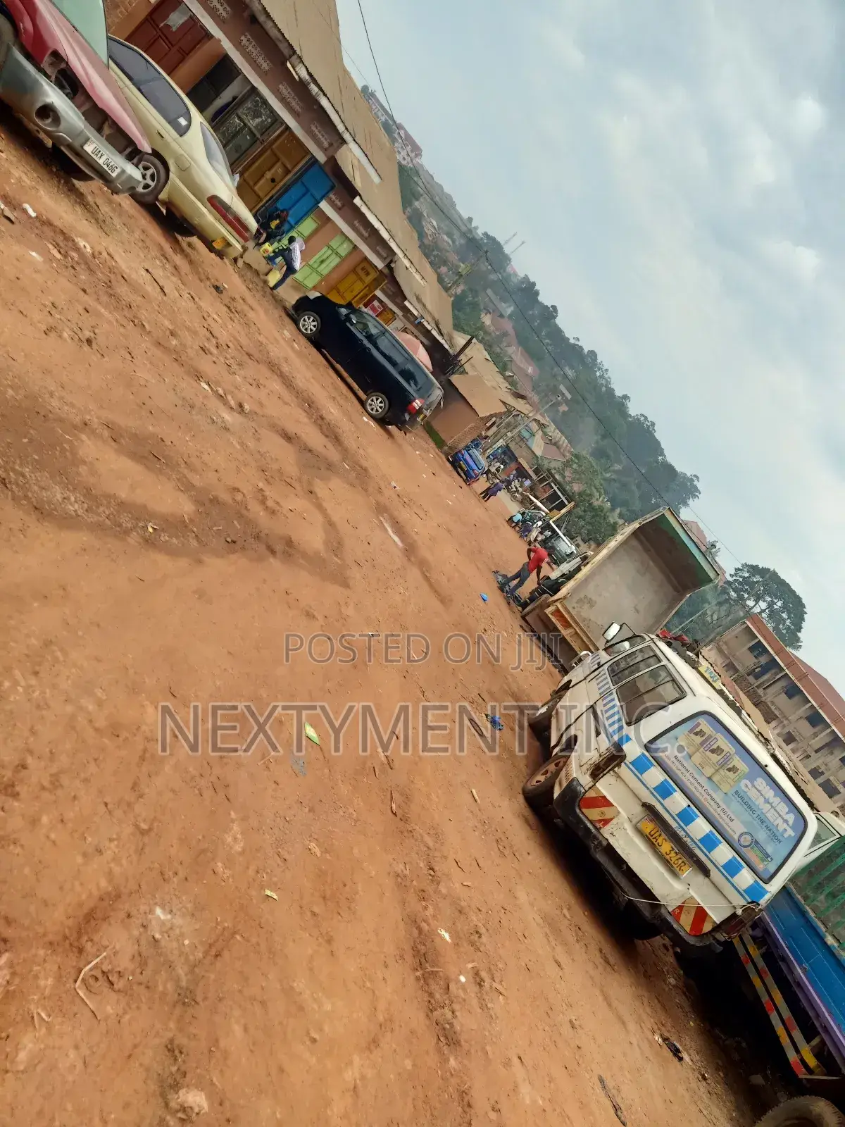 Acre of Land on Main Road in Kyengera Town.