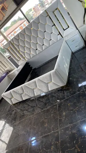 King Sized Bed Made of Wood,White in Color .