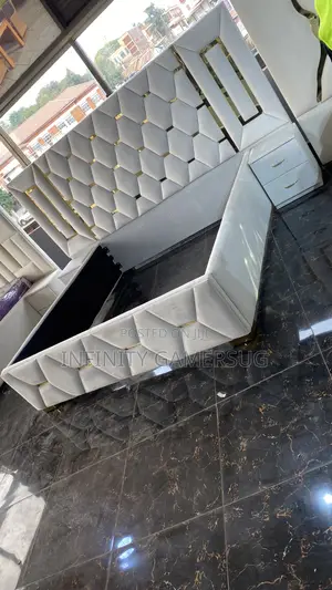 King Sized Bed Made of Wood,White in Color .
