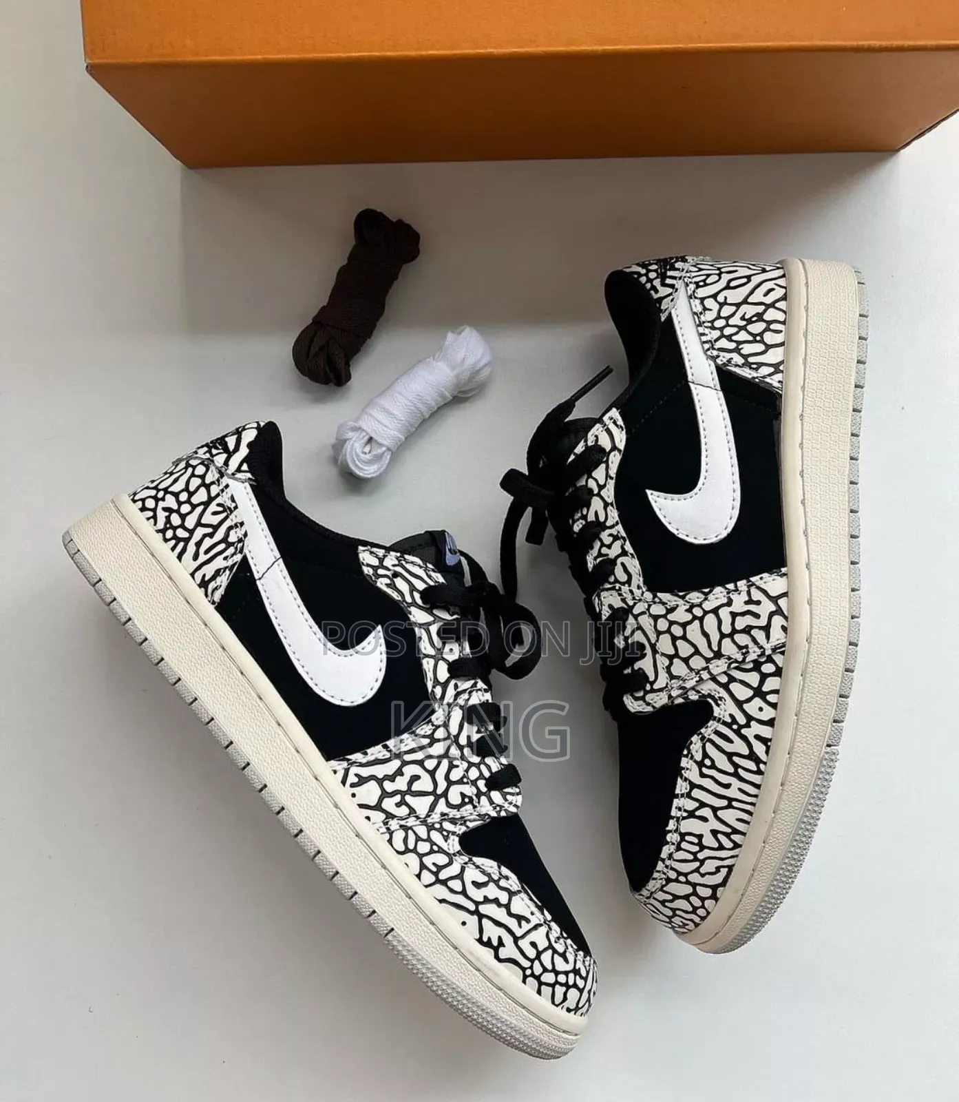 Jordan 1 Low OG Black Cement Elephant Print