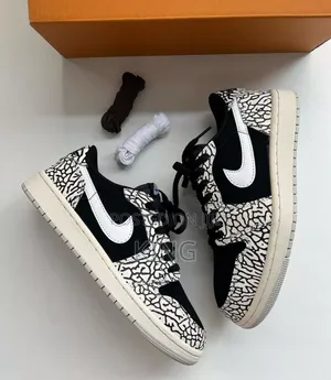 Jordan 1 Low OG Black Cement Elephant Print