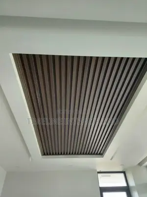 Fluted Panels and Gypsum Ceiling.