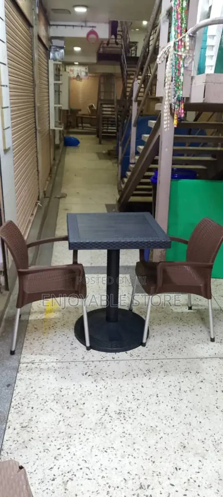 Black Table and 2 Brown Chairs