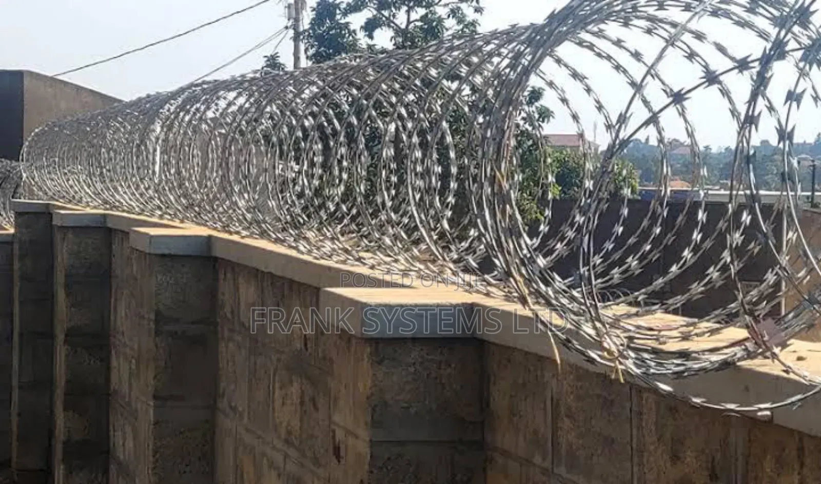 Razor Wire Installation. Smaller Blades
