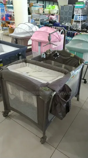 Photo - Baby Trend Cot With Napper Changer and Net