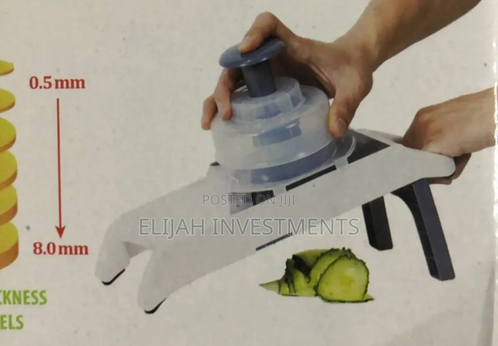 New Hand Held Vegetable Grater