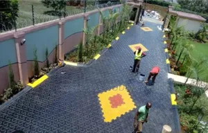 Installation of Coloured Pavers and Structual Land Scape.