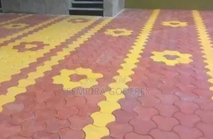 Installation of Coloured Pavers and Structual Land Scape.