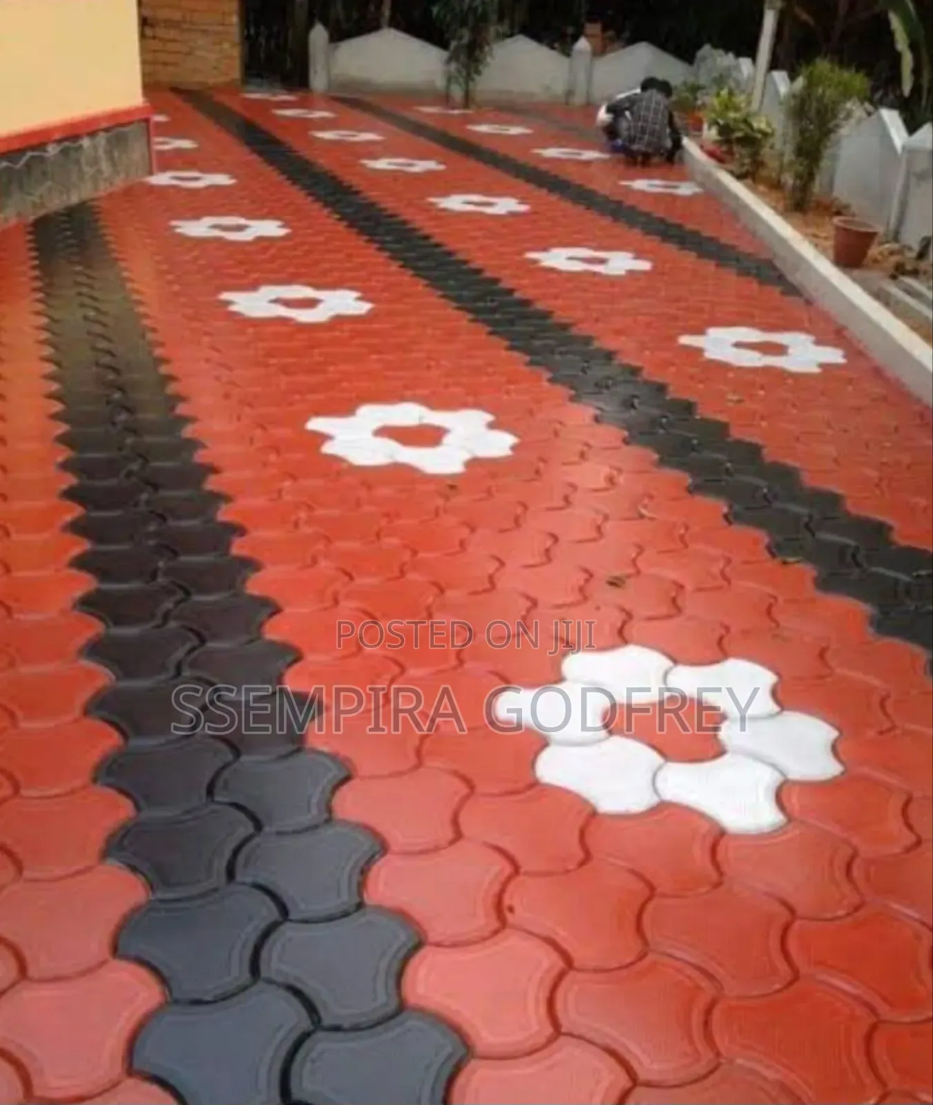 Installation of Coloured Pavers and Structual Land Scape.