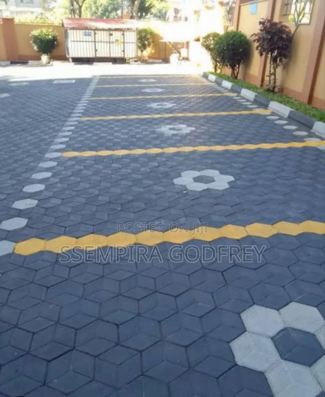Installation of Coloured Pavers and Structual Land Scape.