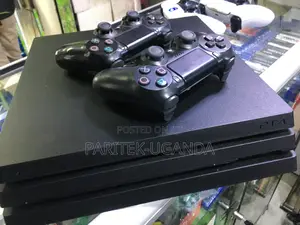 Playstation Ps4 Pro Console With 2 Pads 10 Games