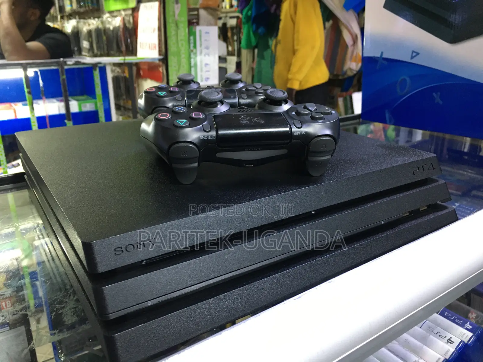 Ps4 Pro Console W/ 2 Pads +10 Games + 02 Controllers