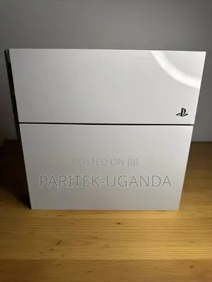 Ps4 White Console in Mint Condition With Accessories