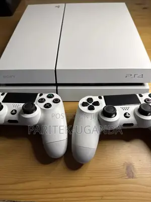 Ps4 White Console in Mint Condition With Accessories