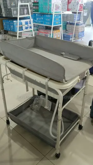 Photo - 2-in-1 Baby Changing Table With Baby Tub With Safety Belt