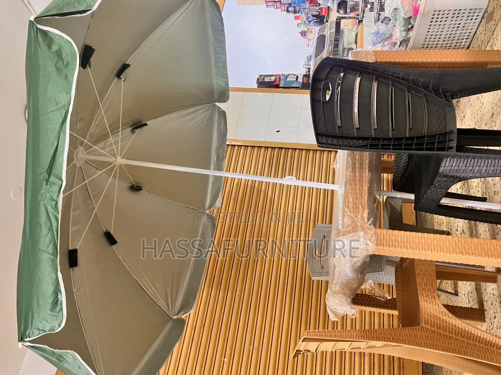 Umbrella and Table Plus Chairs
