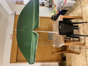 Umbrella and Table Plus Chairs