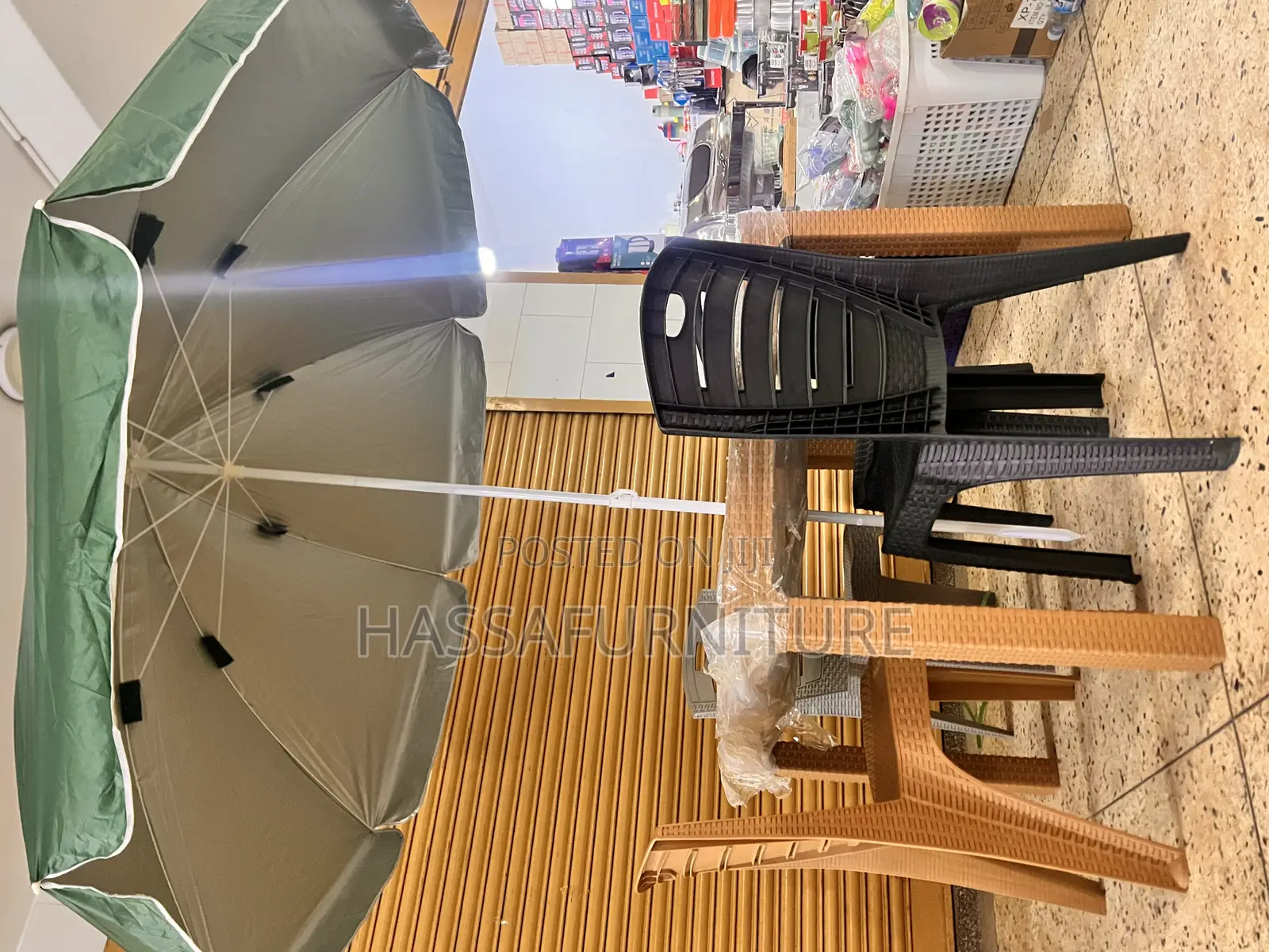 Umbrella and Table Plus Chairs