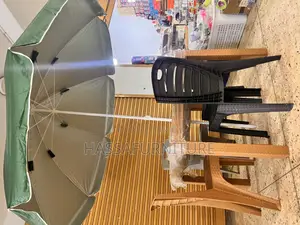 Umbrella and Table Plus Chairs