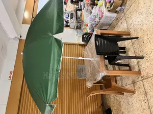 Umbrella and Table Plus Chairs