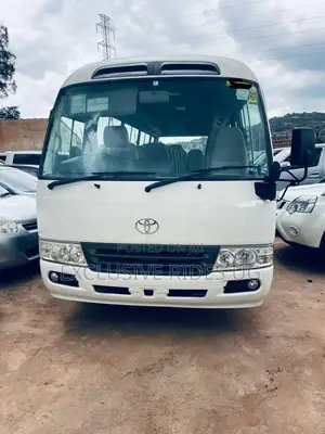 Photo - Toyota Coaster 2012 White