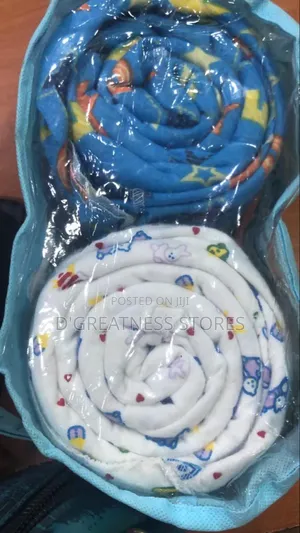 A Pair of Baby Crib Bedsheets