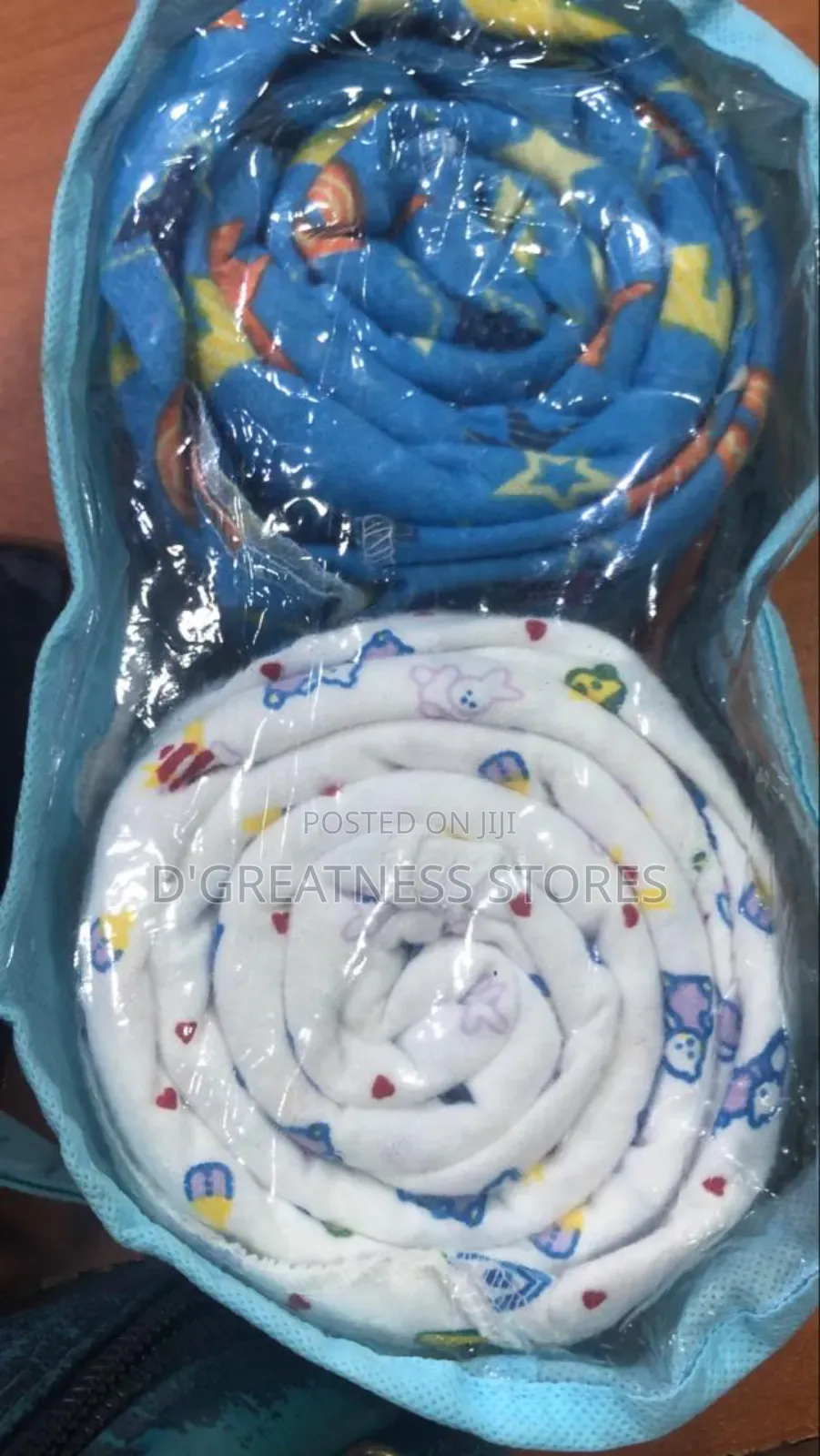 A Pair of Baby Crib Bedsheets