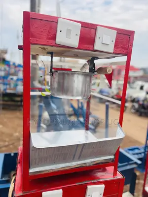 Reds Shine Popcorns Machine