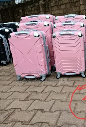 A Set of Three Rubber Suitcases Warranty Available