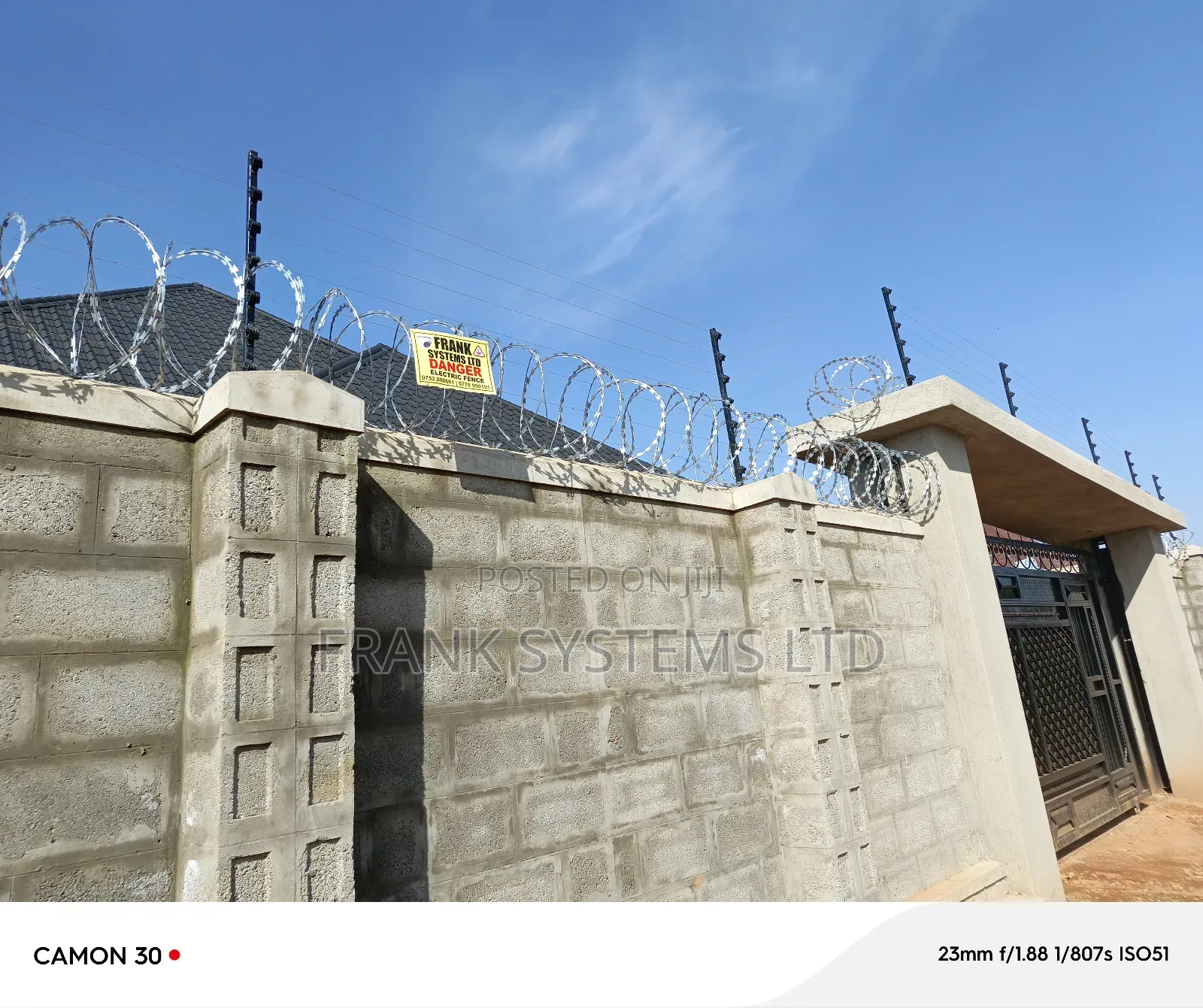 Electric Fence With Razor Wire Fence.