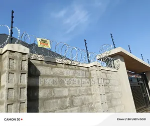 Electric Fence With Razor Wire Fence.