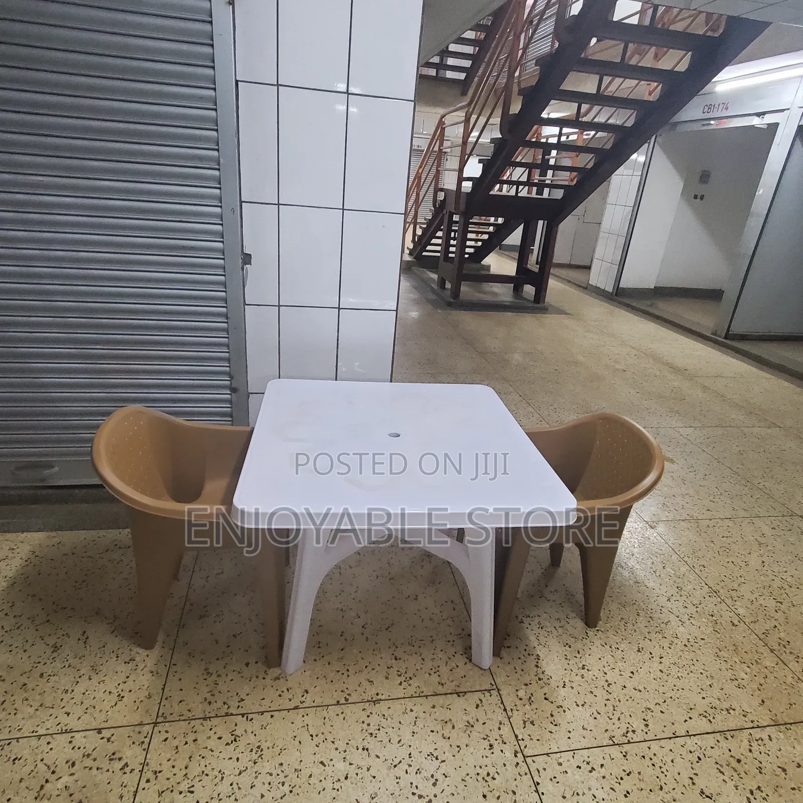Compound Set of Plastic Table and 2 Chairs