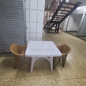 Compound Set of Plastic Table and 2 Chairs
