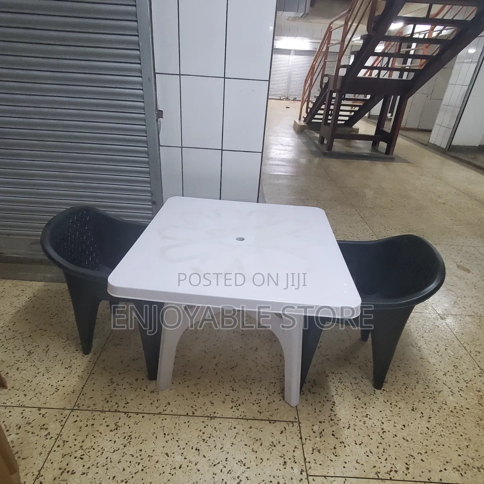 Compound Set of Plastic Table and 2 Chairs