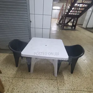 Compound Set of Plastic Table and 2 Chairs
