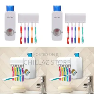 Wall Mounted Automatic Toothbrush Holder.