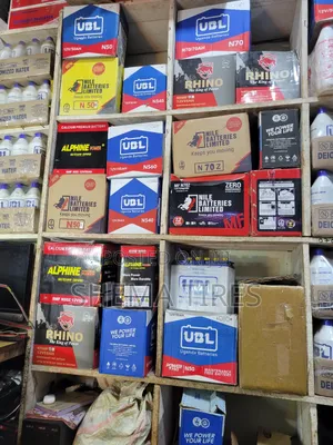 Photo - CAR  Batteries  and Water  for Batteries  and Acid 