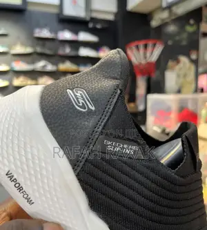 Black/White Skechers Slip Ins Sneakers