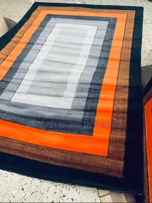 Quality Medium Size Carpet in Orange and Grey