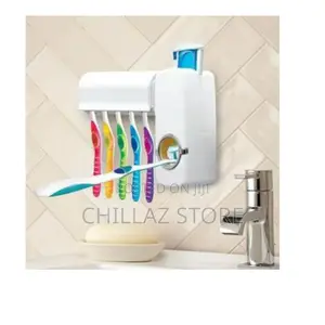 Wall Mounted Toothpaste and Toothbrush Holder/ Dispenser.