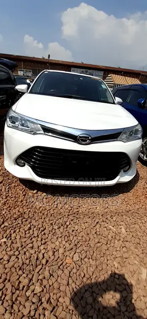 Photo - Toyota Corolla Fielder 1.5 Petrol AWD 2015 White